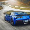 Blue corvette in the road paint by number